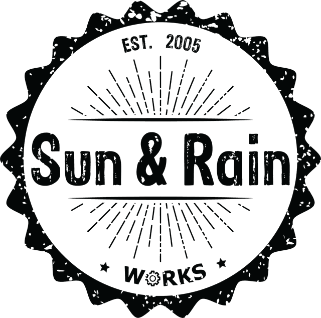 Sun & Rain Works classic stamp badge logo — weathered circular stamp design